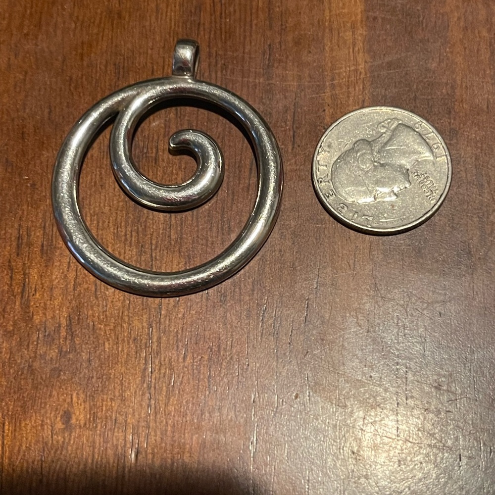 James Avery swirl pendant retired